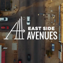 Image of East Side street with overlay of East Side Avenues text. 
